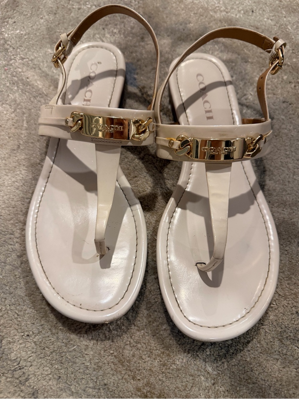 Coach Women's White T-Strap Sandals with Gold Plaque